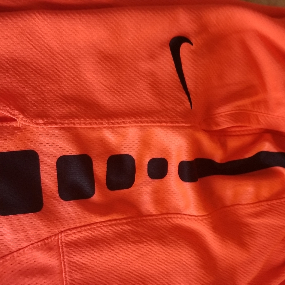 2 boys med nike shorts